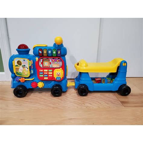 Includes a number pad and walkie-talkie for role-playing. . Vtech ultimate alphabet train